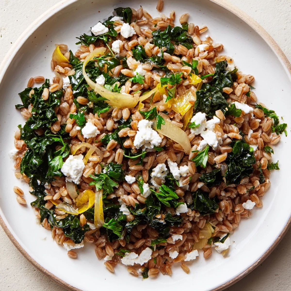 This photo features a steaming plate of Farro & Greens Pilaf, ready to enjoy with family.