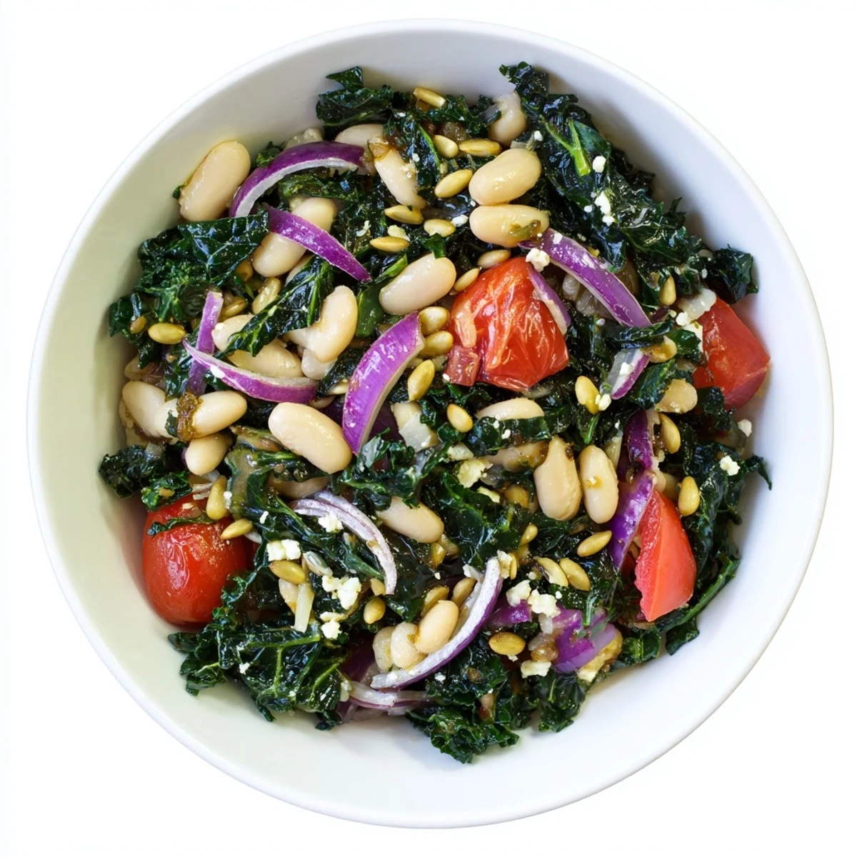 Enjoy a close-up of this White Bean and Kale Salad, showcasing fresh kale leaves, white beans, and optional feta cheese on a rustic wooden table.