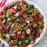 This homemade Simplified Reindeer Chow features a sweet, chocolatey coating with festive holiday colors.