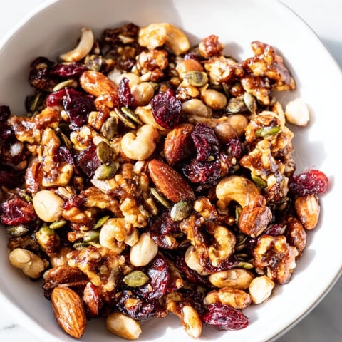 Golden-brown Squirrels Gourmet Nut Bowl, offering a mix of textures and sweet, nutty aromas.