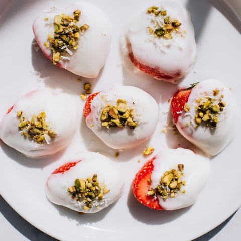 Fresh, sweet Yogurt Dipped Strawberry halves, a light and creamy dessert, ready to enjoy.