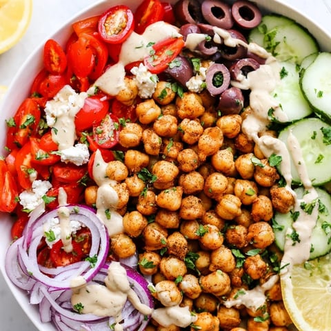 Golden, roasted chickpeas and fresh veggies star in a vibrant Mediterranean Chickpea Bowl.