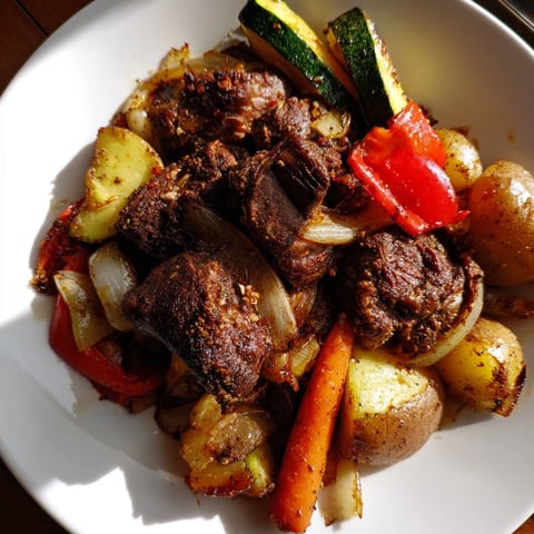 Tender Jordanian Zarb, with juicy lamb and vibrant vegetables, slowly cooked with smoky flavor.