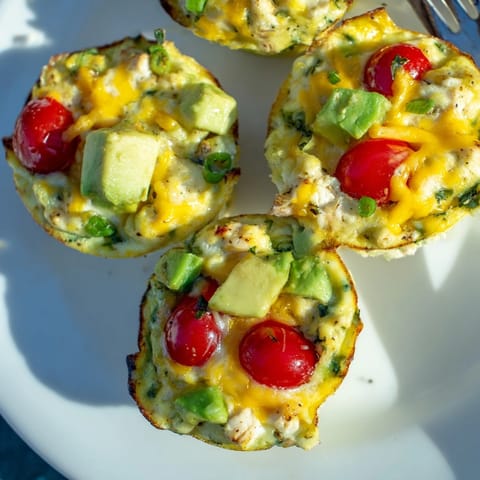 Savory Avocado Ranch Chicken Egg Cups, a vibrant display of color, ready to serve.