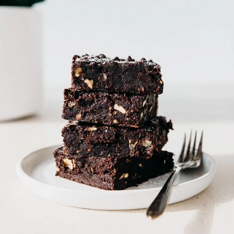 Decadent zero-waste brownies made from nut-milk pulp, served warm with ice cream.  