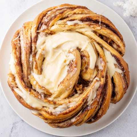 Delicious, pull-apart Cinnamon Swirl Christmas Tree Bread with a generous cinnamon sugar filling.