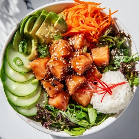 A colorful close-up of a delightful Poke Bowl Salad with tender fish and crunchy veggies.