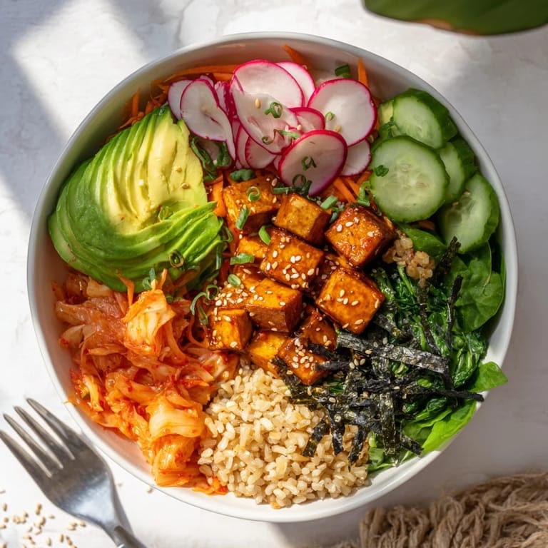 Delicious Fermented Vegetable Bowl drizzled with sesame dressing, loaded with fresh greens.